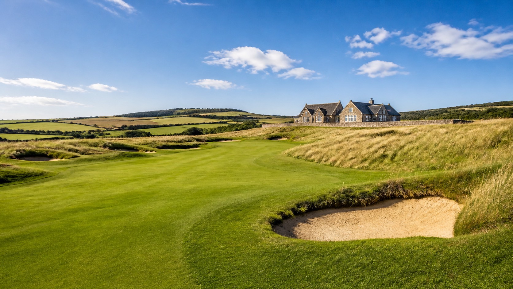 A sunny British links-style golf course with sweeping fairways and sand bunkers